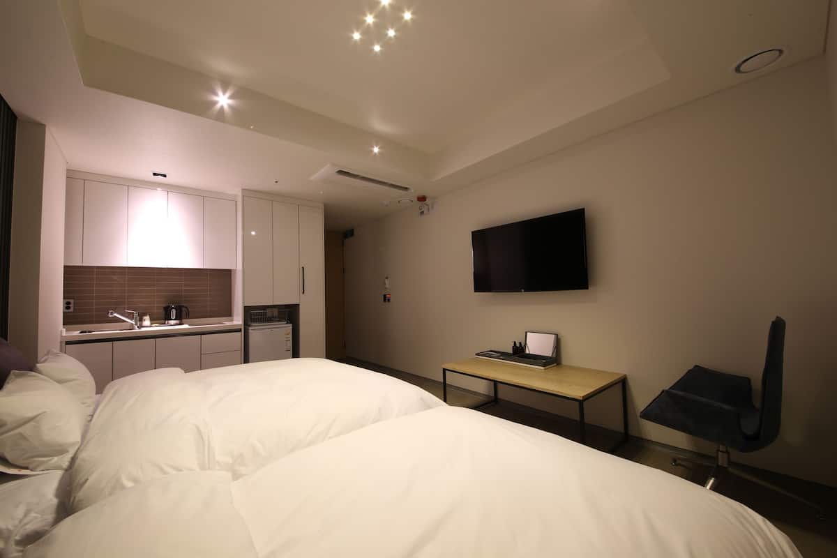 Premium bedding, individually decorated, desk, laptop workspace