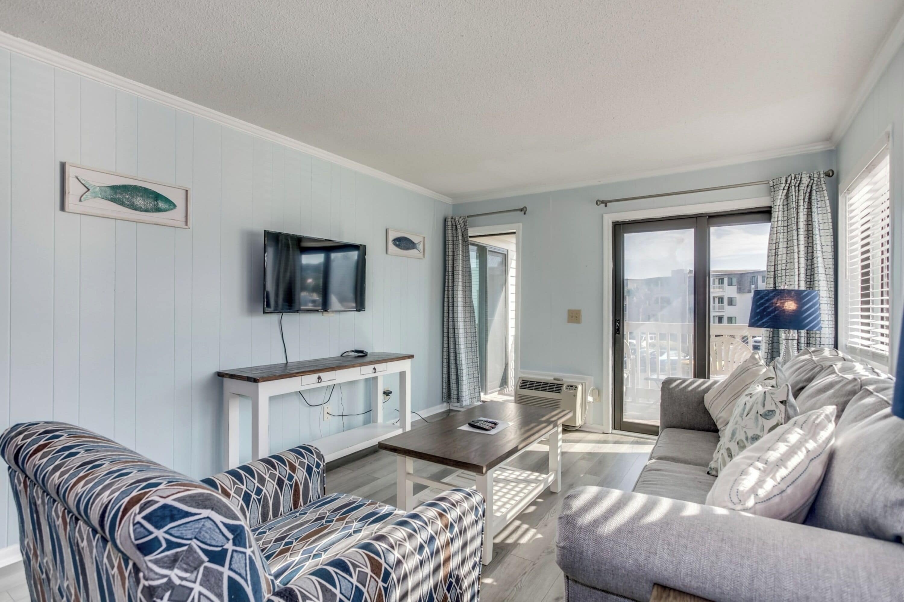 Comfort Condo, 2 Bedrooms, Balcony, Ocean View | Living room | 54-cm flat-screen TV with cable channels, TV