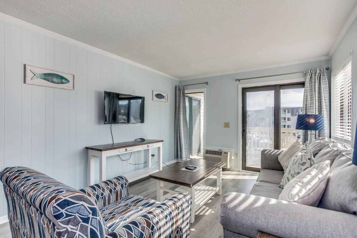 Comfort Condo, 2 Bedrooms, Balcony, Ocean View | Living room | 54-cm flat-screen TV with cable channels, TV