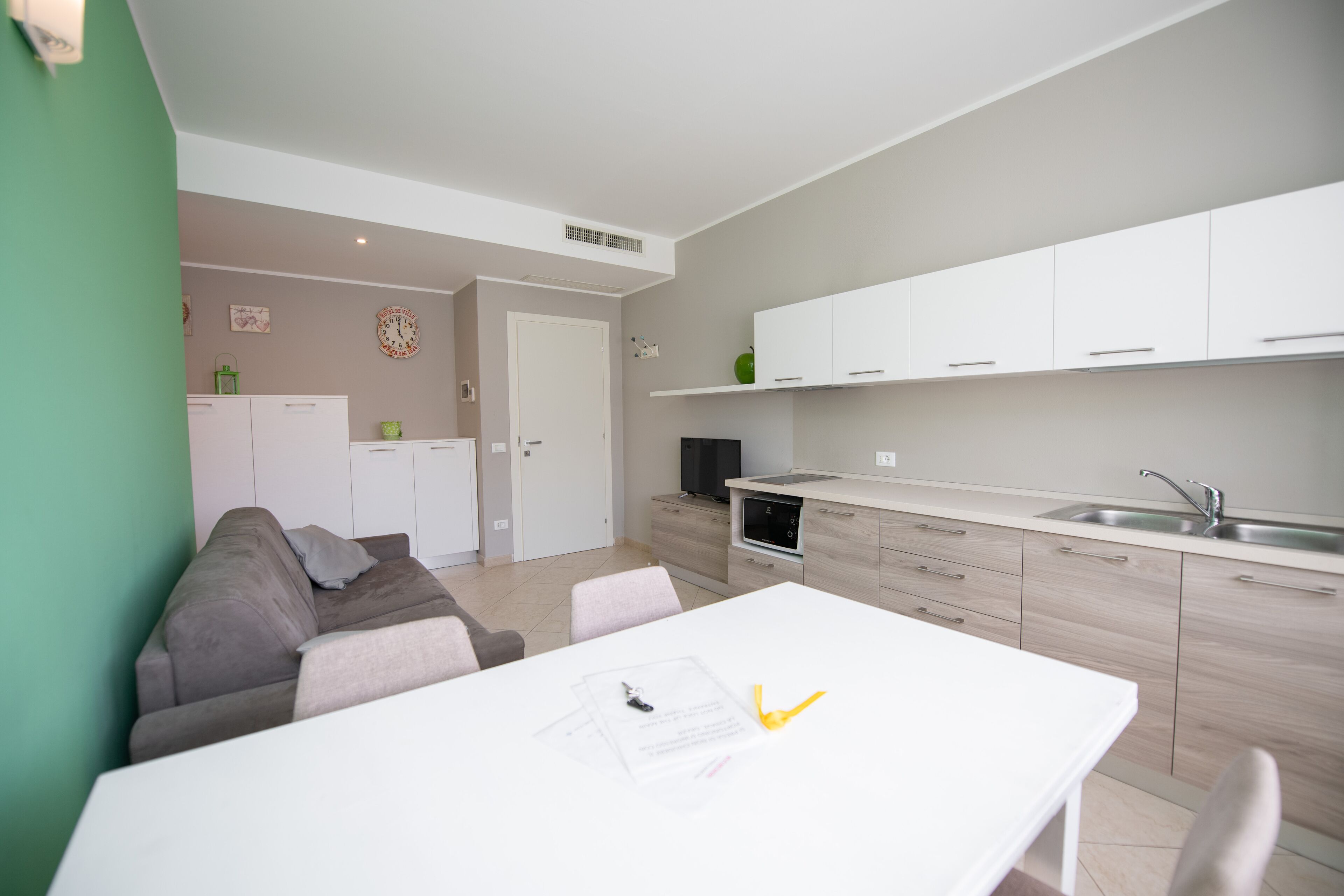 Departamento, 1 habitación (Margherita) | Cocina privada | Refrigerador, microondas, parrilla de estufa y cafetera y tetera 