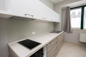 Appartement, 1 chambre (Margherita) | Cuisine privée | Réfrigérateur, four à micro-ondes, surface de cuisson, cafetière-théière