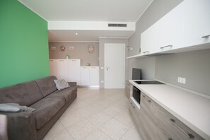 Leilighet, 1 soverom (Margherita) | Eget kjøkken | Kjøleskap, mikrobølgeovn, kokeplater og kaffetrakter/tekoker