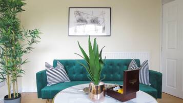 Deluxe Apartment | Living area | 49-inch Smart TV with cable channels, TV