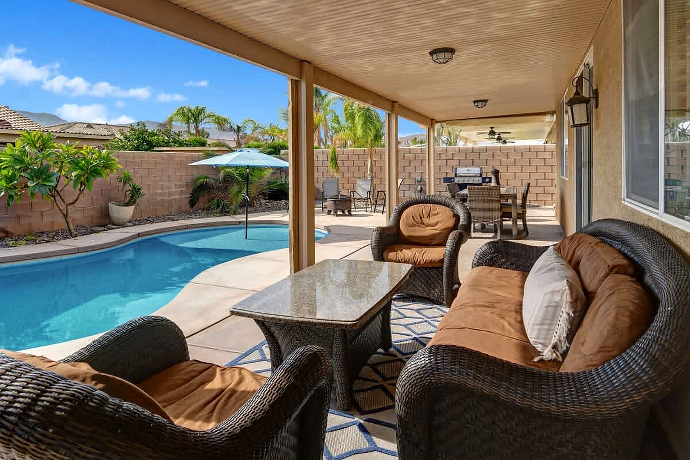 Covered patio lounge by the pool