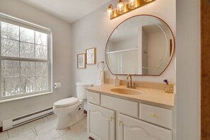 Bathtub, hair dryer, towels