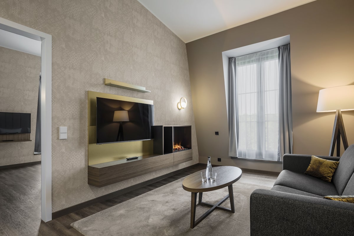 master suite | living area | 80-inch flat-screen tv with cable channels, tv, tablet