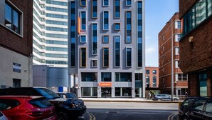A modern building with a flat facade, multiple windows, and a sign for 'easyHotel'. - easyHotel Cardiff (Cardiff)