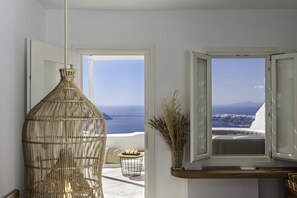 Enjoy breathtaking views of the sea and mountains from this room's window.