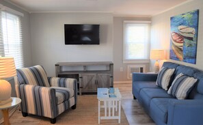 Firemannsrom – premium | Oppholdsområde | En 1-tommers Flatskjerm-TV med kabel-kanaler samt TV