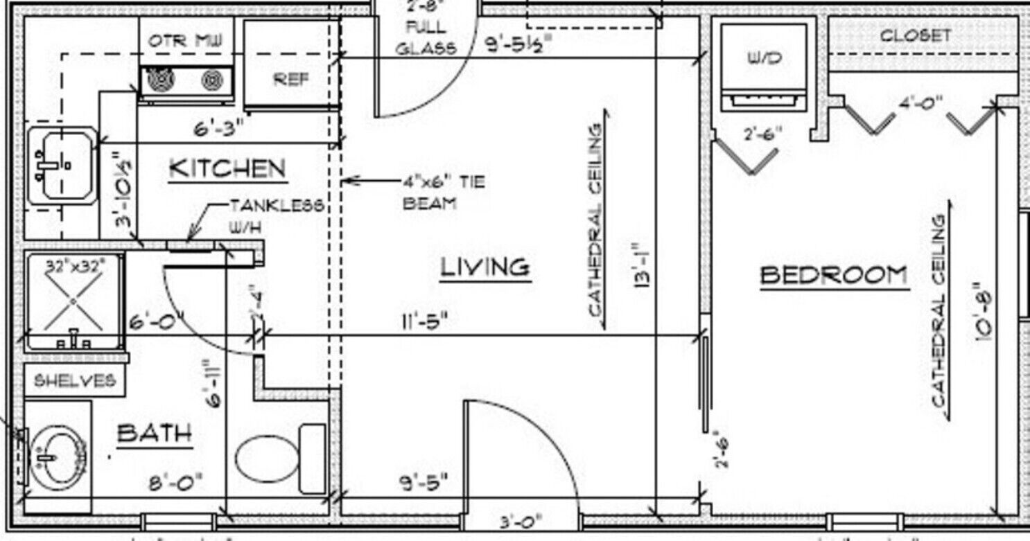 Un plan d’étage comprenant une cuisine, un espace de vie, une chambre et une salle de bain. Les dimensions de la cuisine sont de 6 pieds 3 pouces, de l’espace de vie de 11 pieds 5 pouces et de la chambre de 13 pieds 1 pouce.