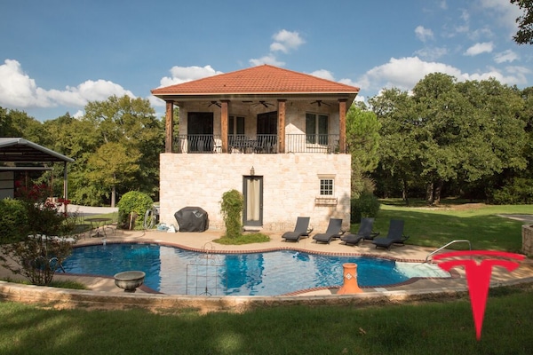 16 gated acres, with saltwater pool, hot tub, grill and tesla charging.