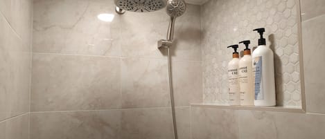 Hair dryer, towels, soap, shampoo
