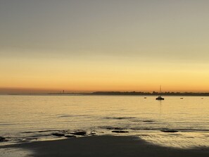 On the beach, sun-loungers
