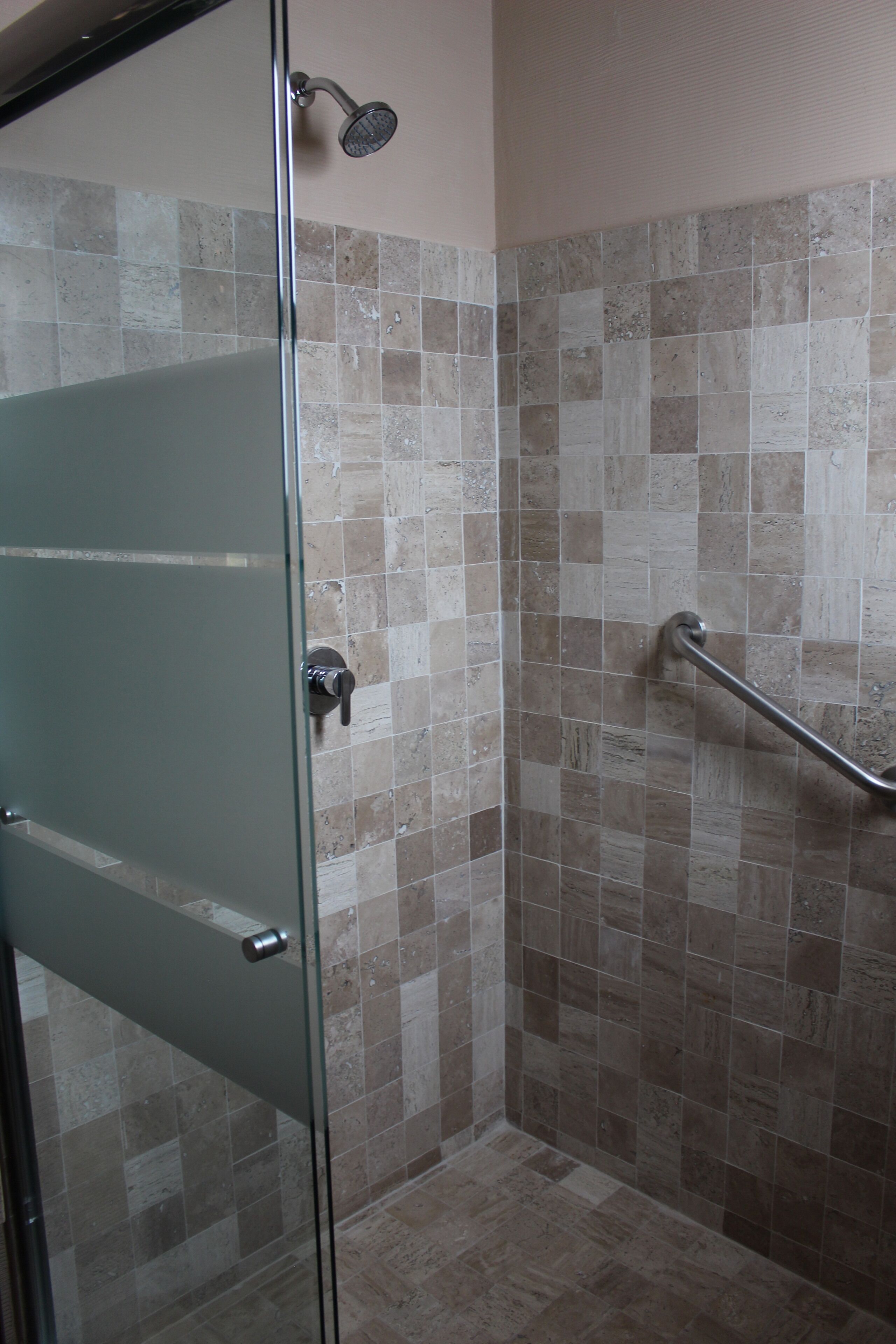 shower, rainfall showerhead, hair dryer, towels