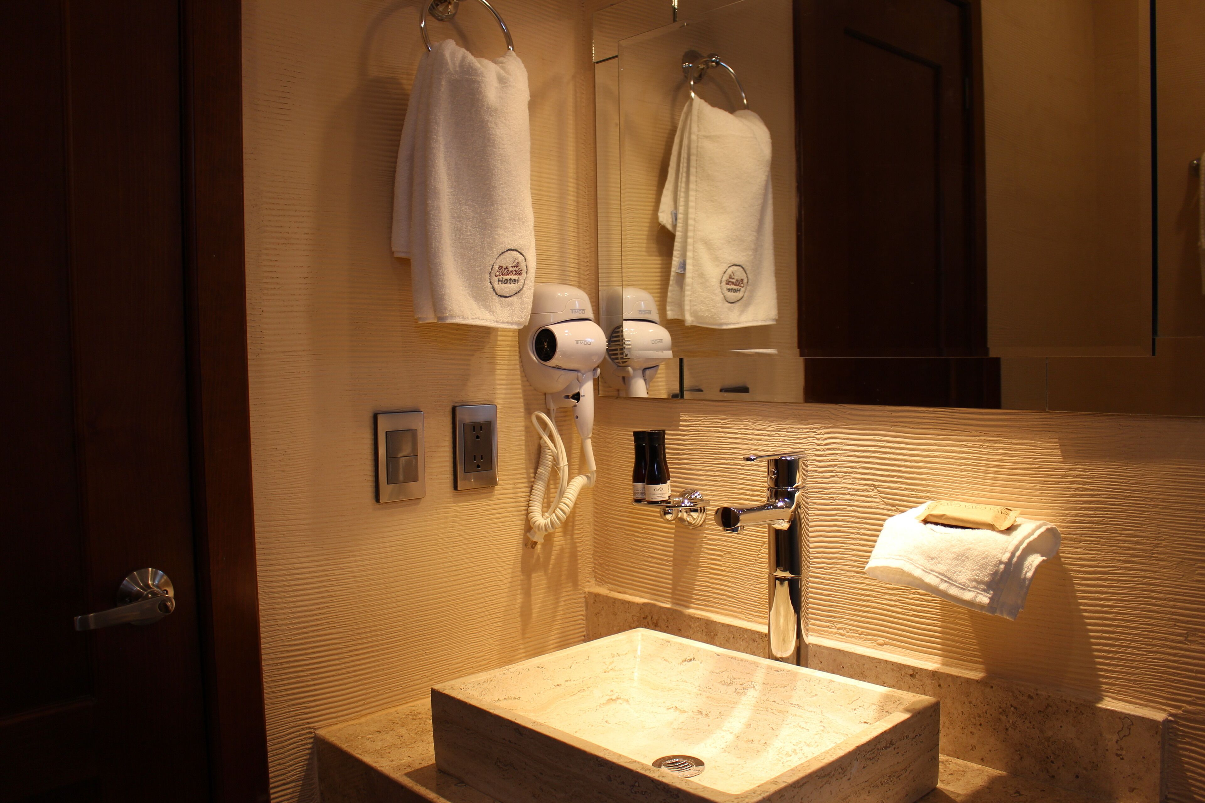 shower, rainfall showerhead, hair dryer, towels