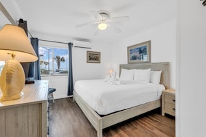 2 habitaciones, tabla de planchar con plancha y ropa de cama