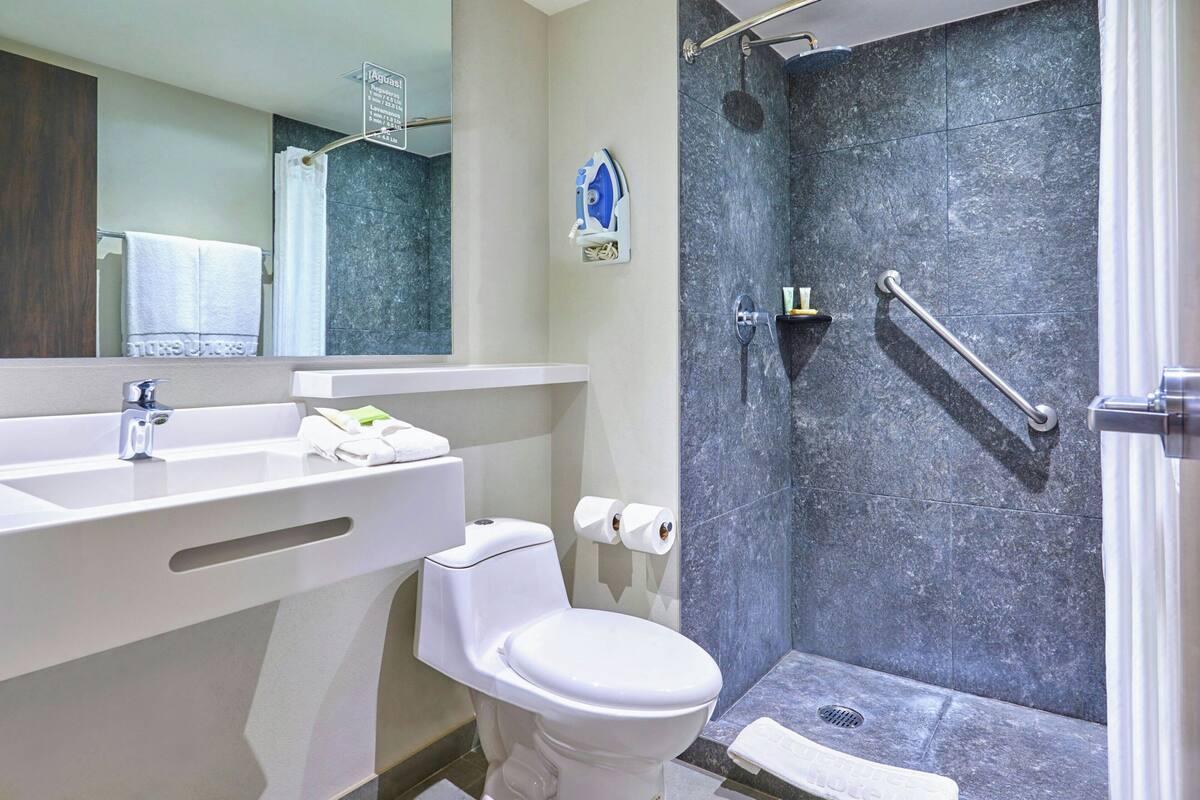 shower, free toiletries, towels, soap