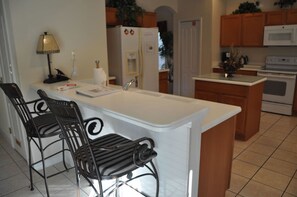 Fridge, microwave, oven, stovetop - Henley Park Vacation Home near Disney, Orlando (Davenport)