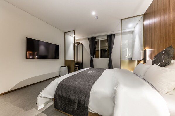 Chambre Double Deluxe | Literie de qualité supérieure, couette en duvet d'oie