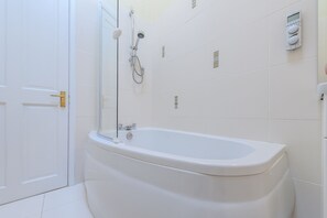 Combined shower/bathtub, hair dryer