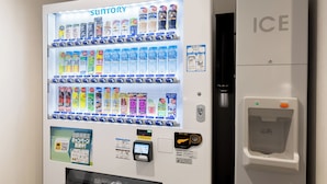 A vending machine with various beverages and a water dispenser. - Hotel Forza Osaka Namba Dotonbori (Osaka)