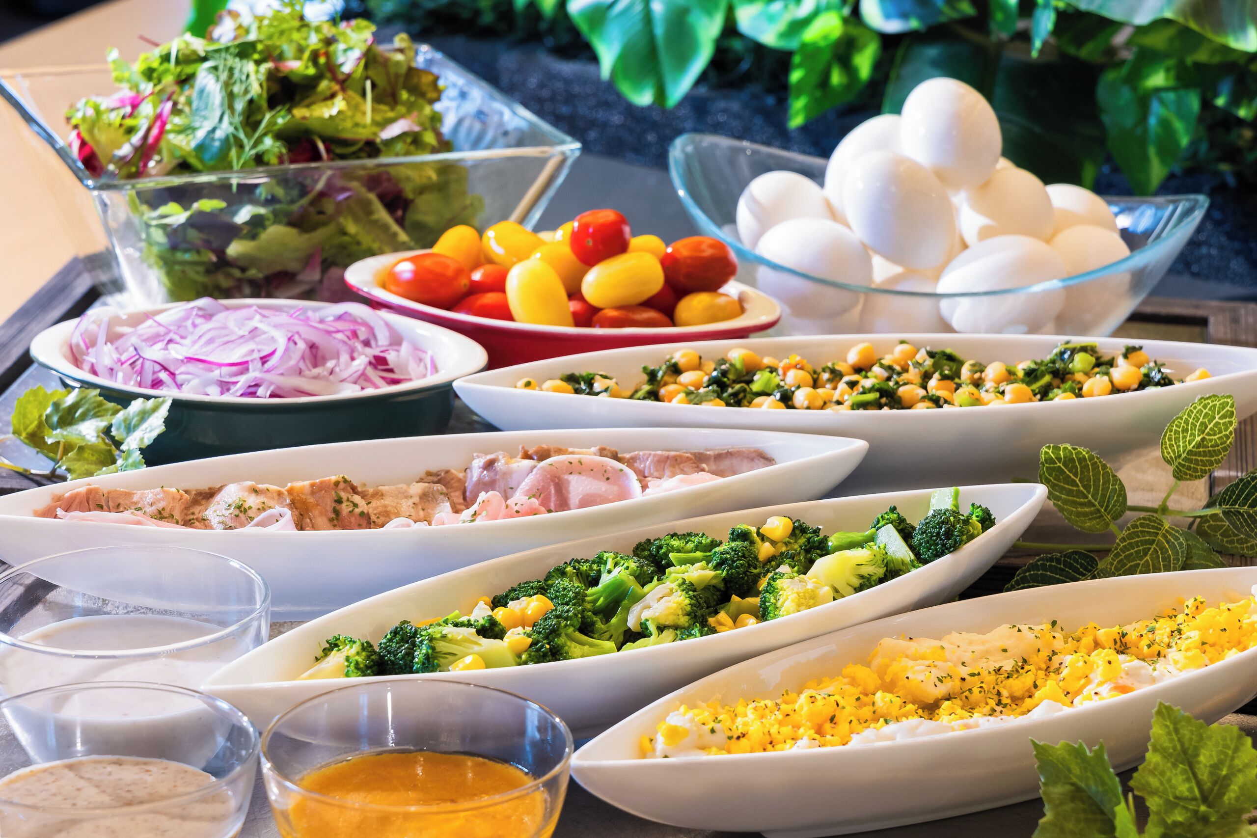 A variety of food dishes arranged on a table.