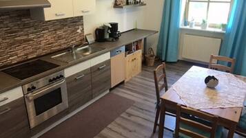 Apartment, Patio | Private kitchen | Fridge, oven, stovetop, dishwasher