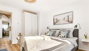 3 bedrooms, desk, iron/ironing board, travel cot