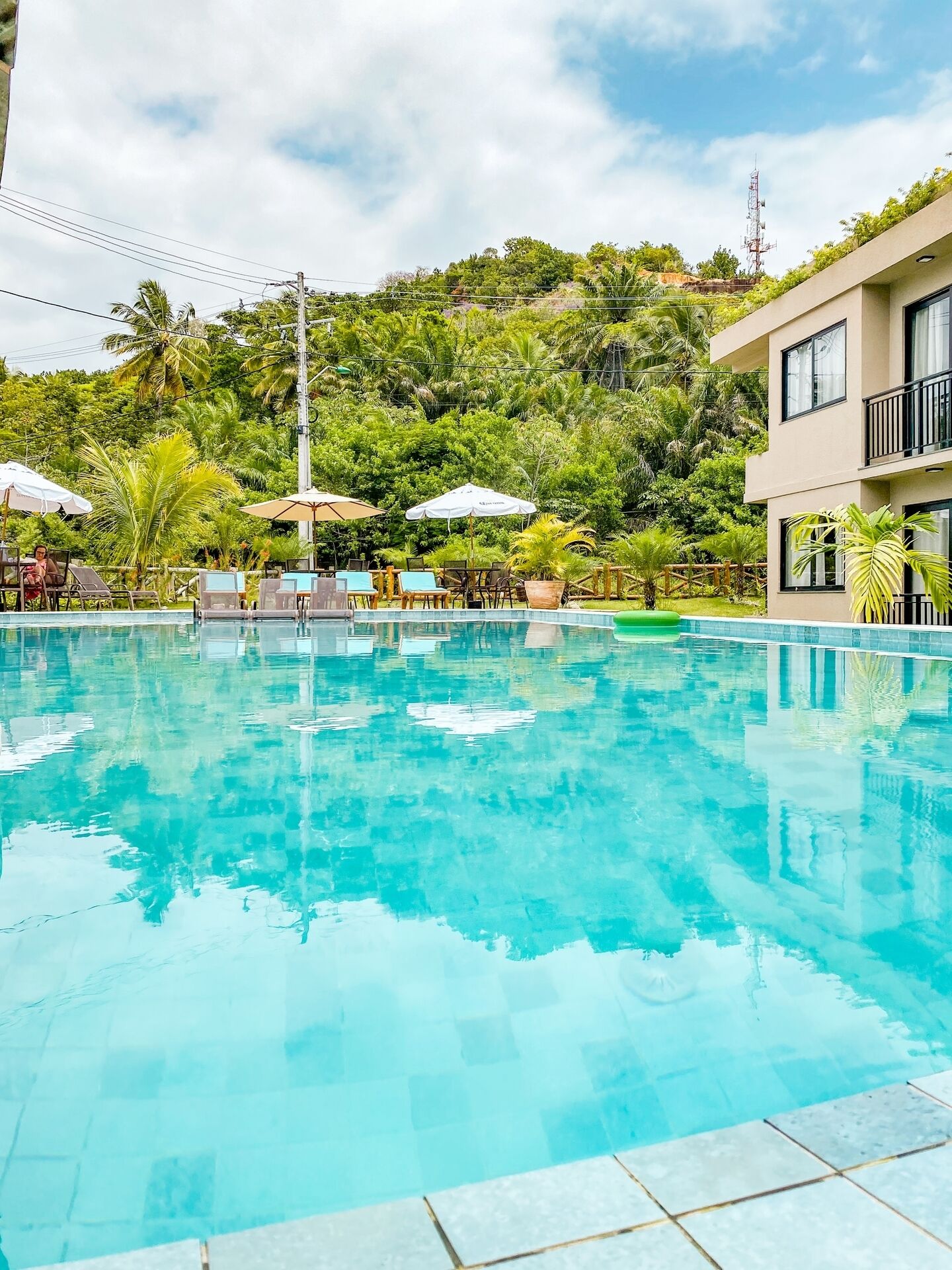 outdoor pool, open 10:00 am to 8:00 pm, pool loungers