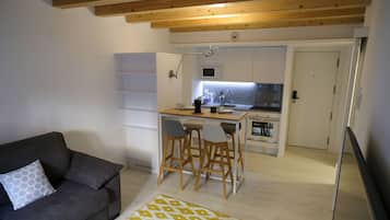 Deluxe Apartment, 2 Bedrooms | Private kitchen | Full-size fridge, microwave, oven, stovetop