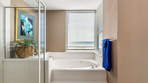 Combined shower/tub, jetted tub, hair dryer, towels