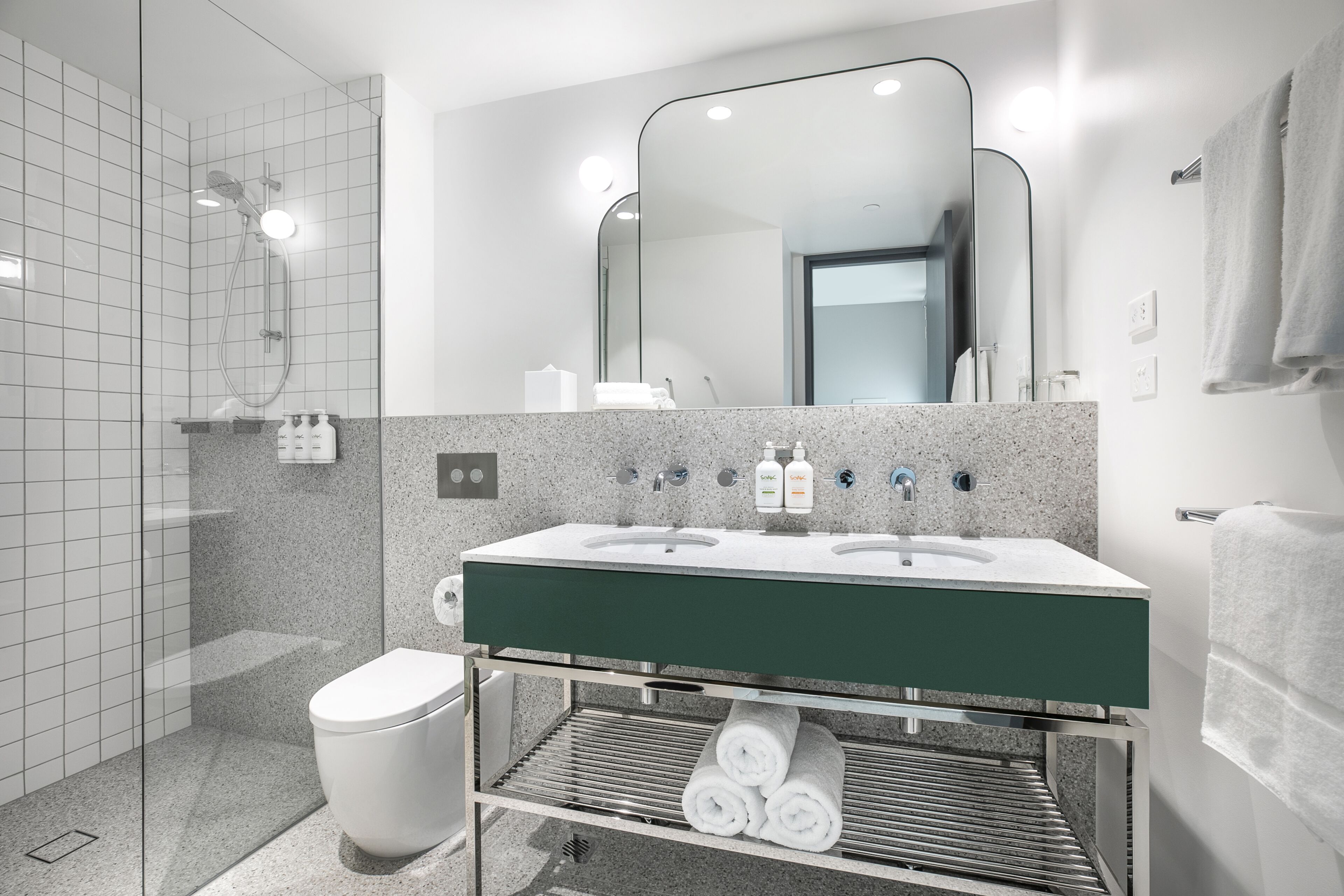 eco-friendly toiletries, hair dryer, towels