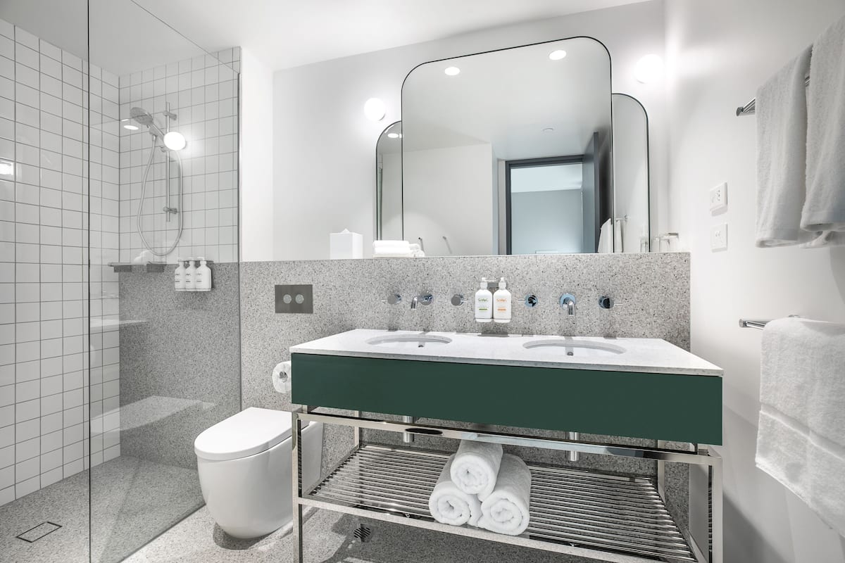 eco-friendly toiletries, hair dryer, towels