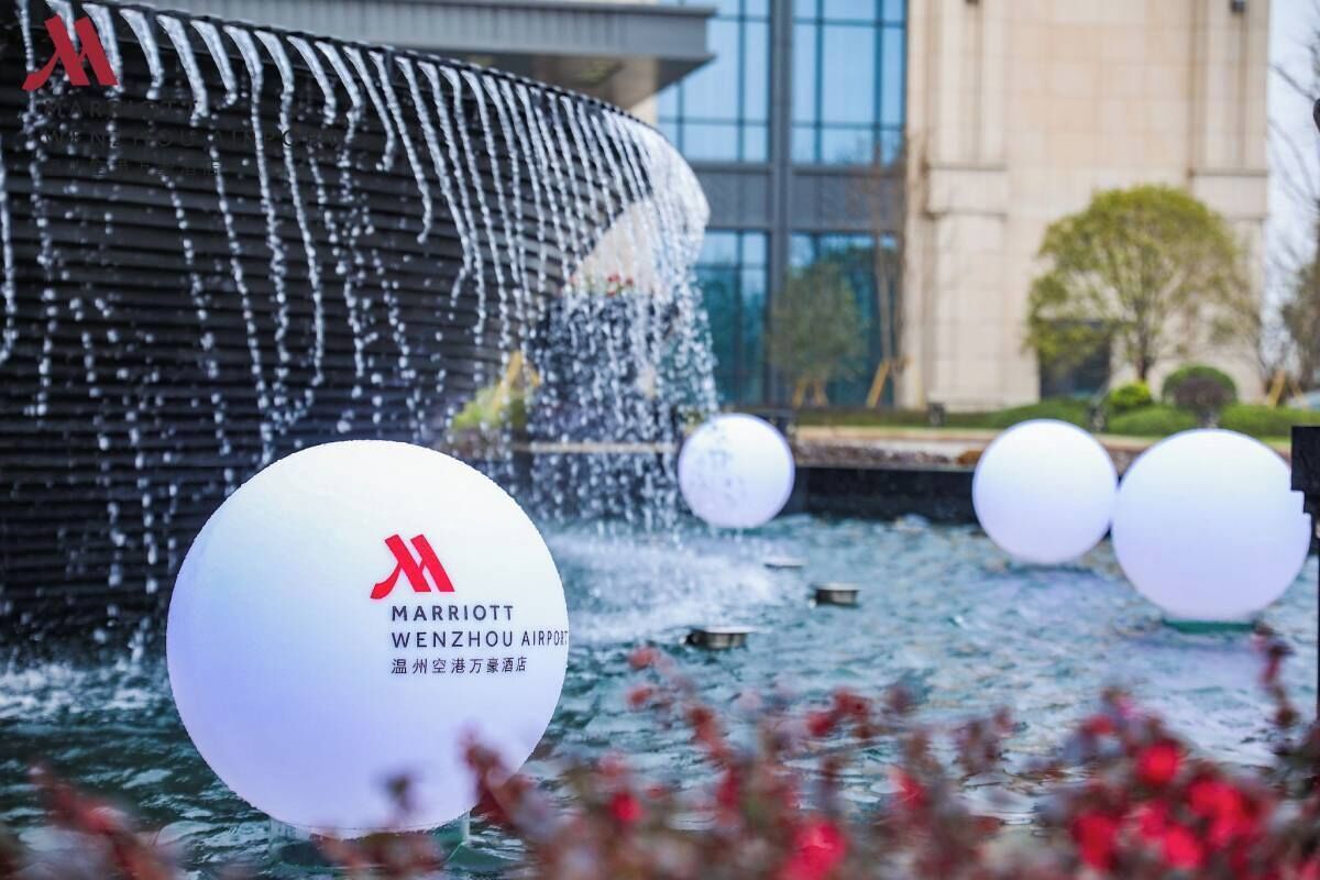 A Marriott Wenzhou Airport fountain with water jets and spherical decorations.