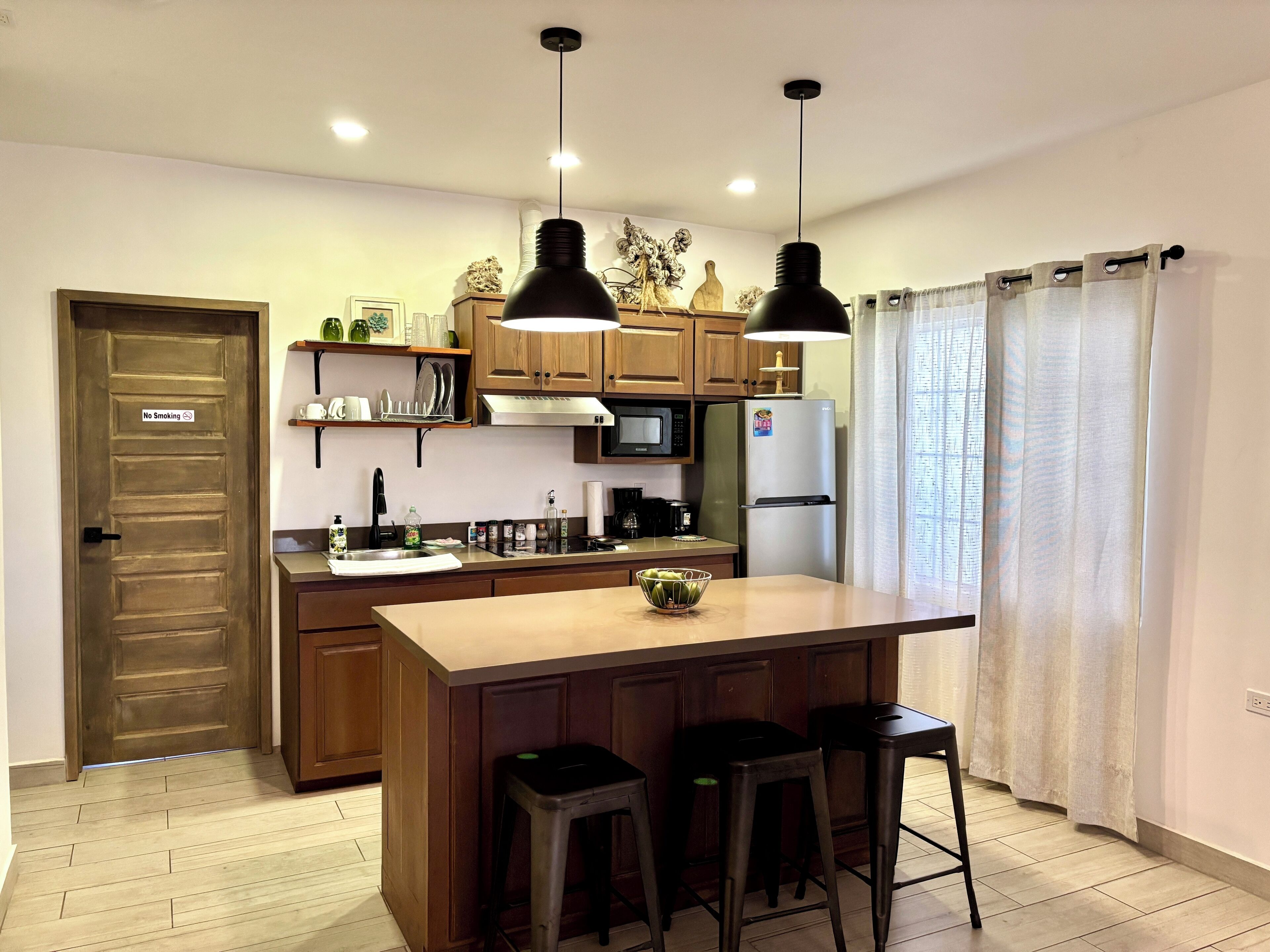 Fridge, microwave, coffee/tea maker, toaster