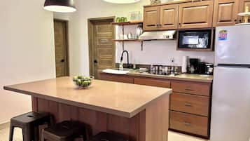 Fridge, microwave, coffee/tea maker, toaster