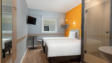 Habitación estándar, 2 camas individuales | Ropa de cama de alta calidad, cunas gratuitas y wifi gratis