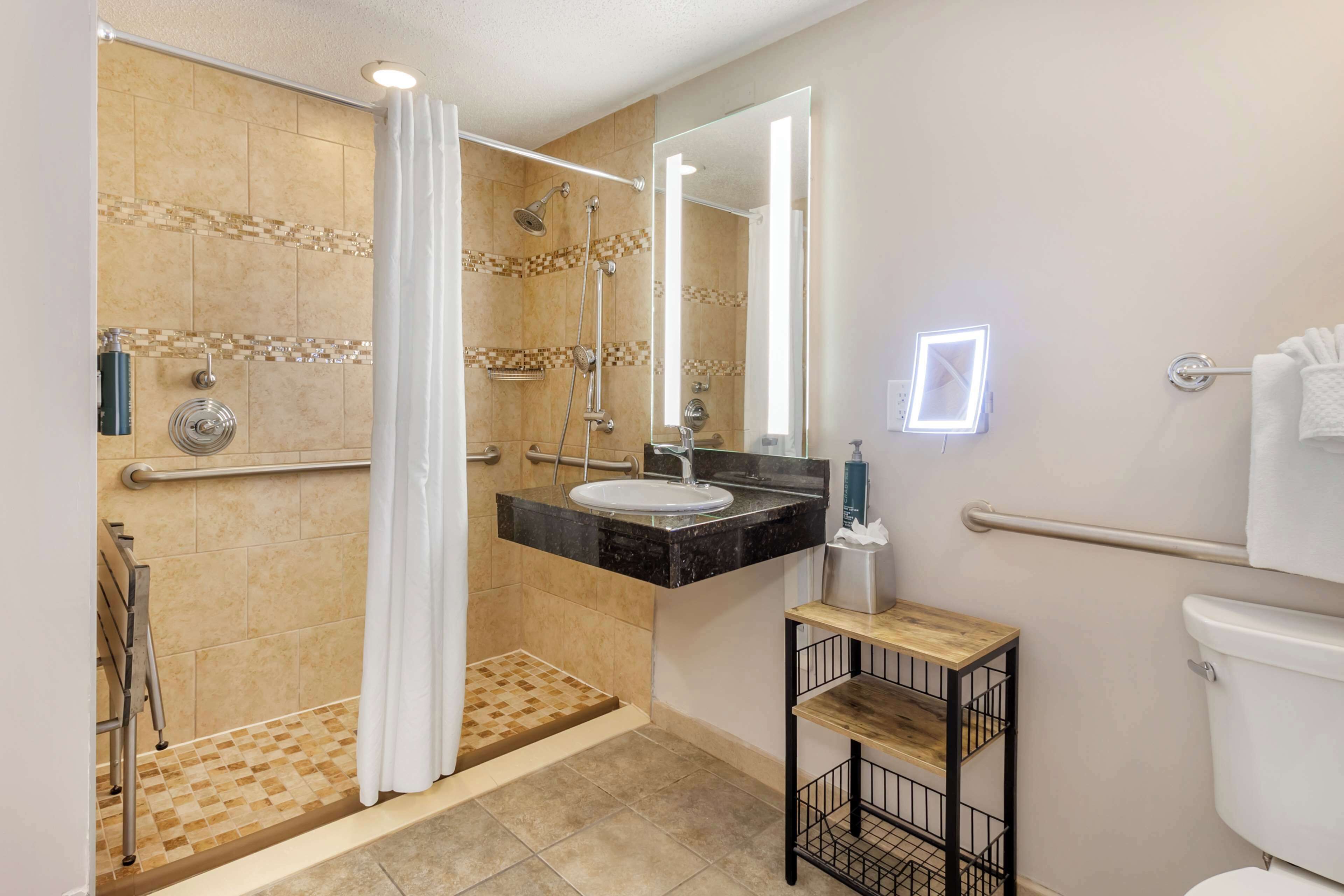 1 bedroom, 1 king oceanfront suite, accessible (hearing, roll-in shower) | bathroom shower