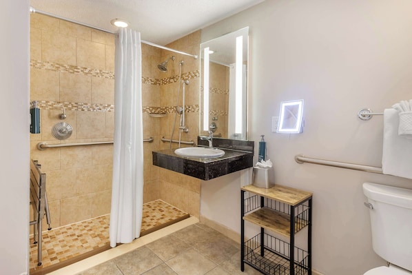 A modern bathroom with a shower, toilet, and sink. - Hilton Grand Vacations Club Anderson Ocean Myrtle Beach (Myrtle Beach)