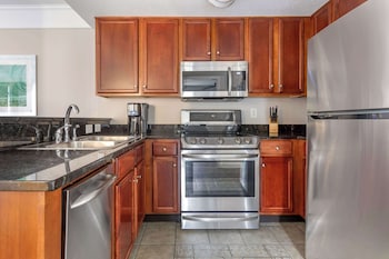 Full-size fridge, microwave, stovetop, dishwasher at Hilton Grand Vacations Club Anderson Ocean Myrtle Beach