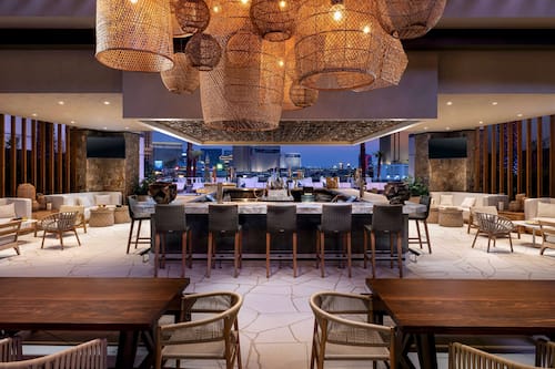 7 bars/lounges, 4 poolside bars
