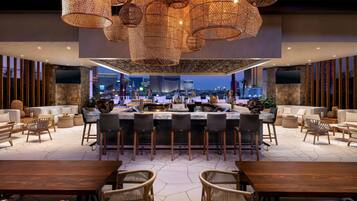 7 bars/lounges, poolside bar