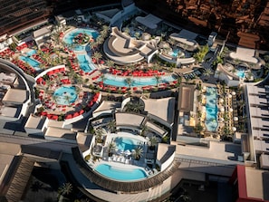 7 outdoor pools, open 9:00 AM to 4:00 PM, pool cabanas (surcharge) - Las Vegas Hilton at Resorts World (Las Vegas)