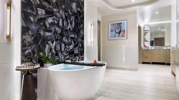 Premium Suite, 2 Bedrooms | Bathroom | Shower, free toiletries, hair dryer, bathrobes