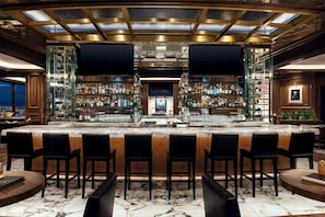 6 bars/lounges, 4 poolside bars