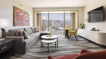 Een 55-inch flatscreentelevisie met kabelzenders, televisie en Netflix