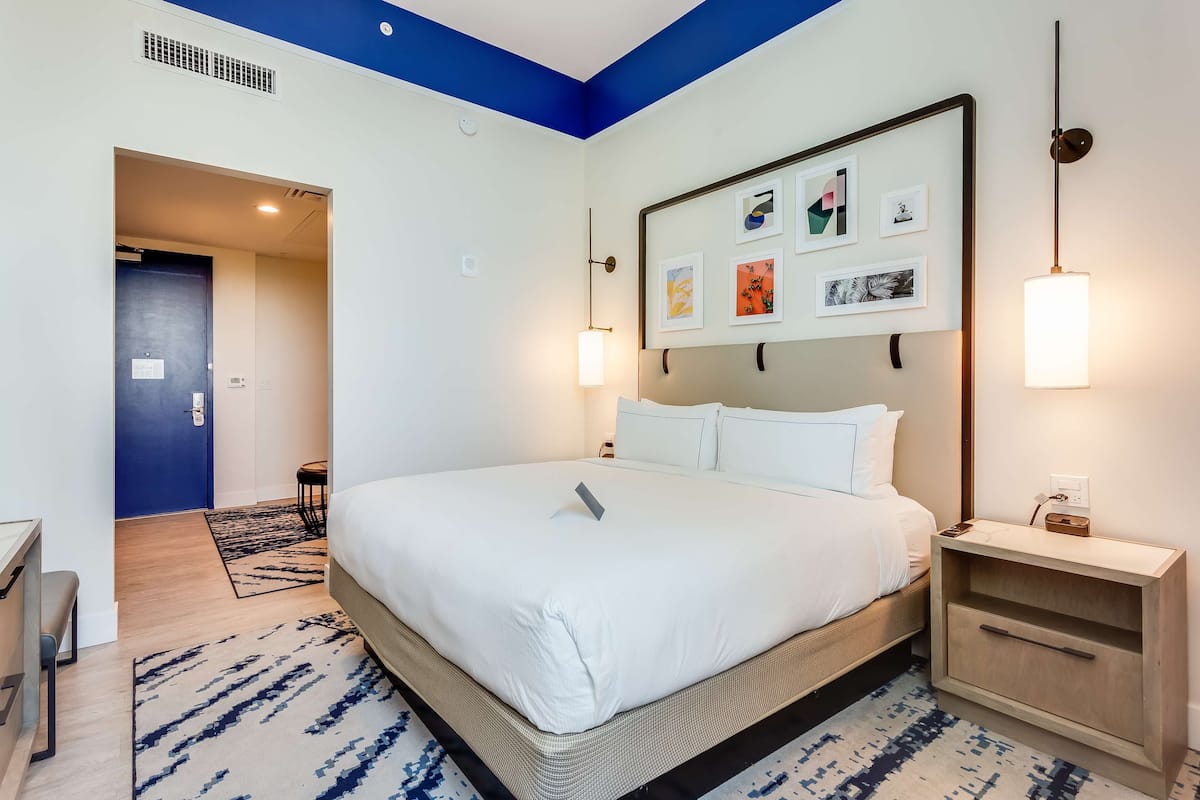 Suite, 1 King Bed | 1 bedroom, down comforters, pillowtop beds, in-room safe