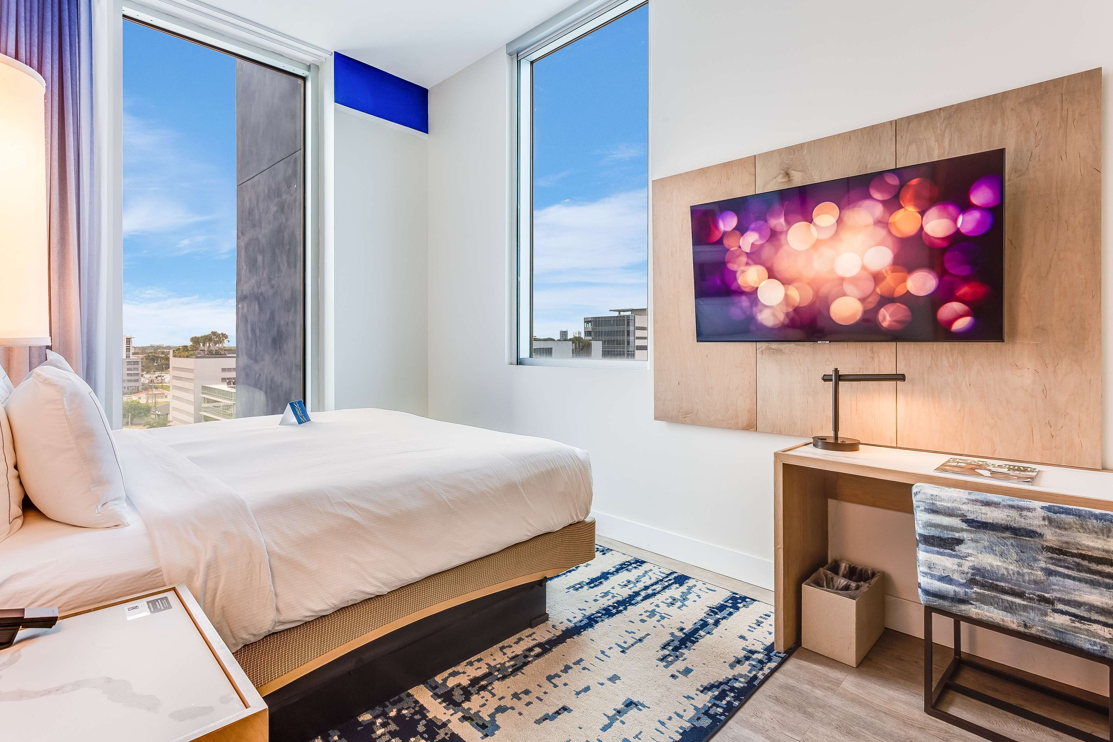 Down duvets, pillow-top beds, in-room safe, laptop workspace