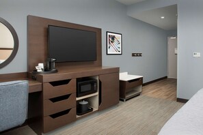 Desk, laptop workspace, bed sheets