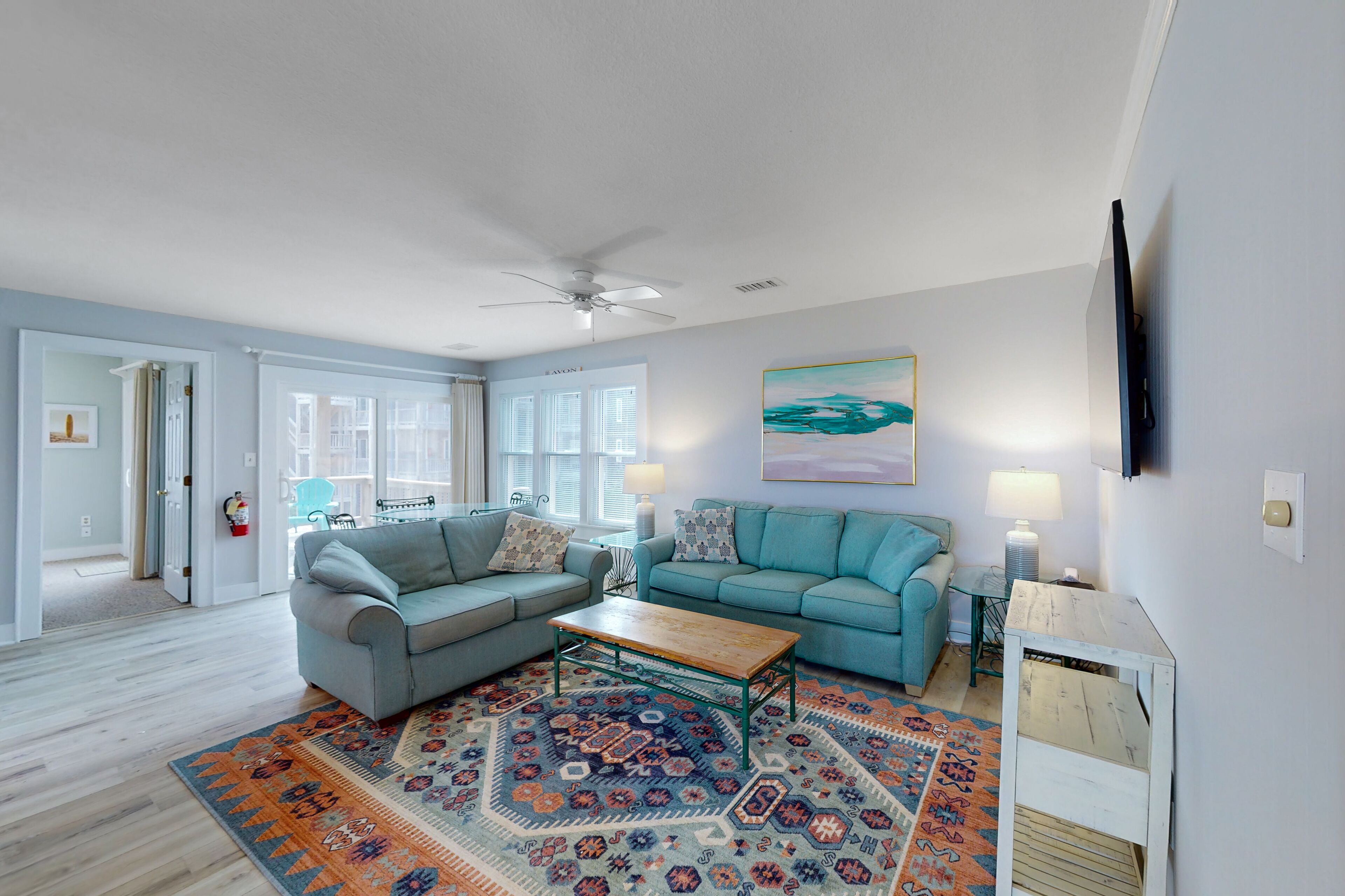 Beautifully updated condo with outdoor pool, beach access, AC & washer/dryer